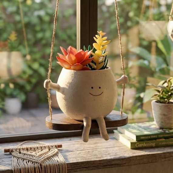 Pequeña maceta en columpio sur cache-pot.fr