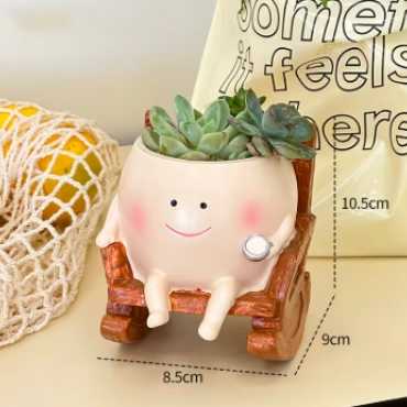 Petit pot sur rocking-chair sur cache-pot.fr